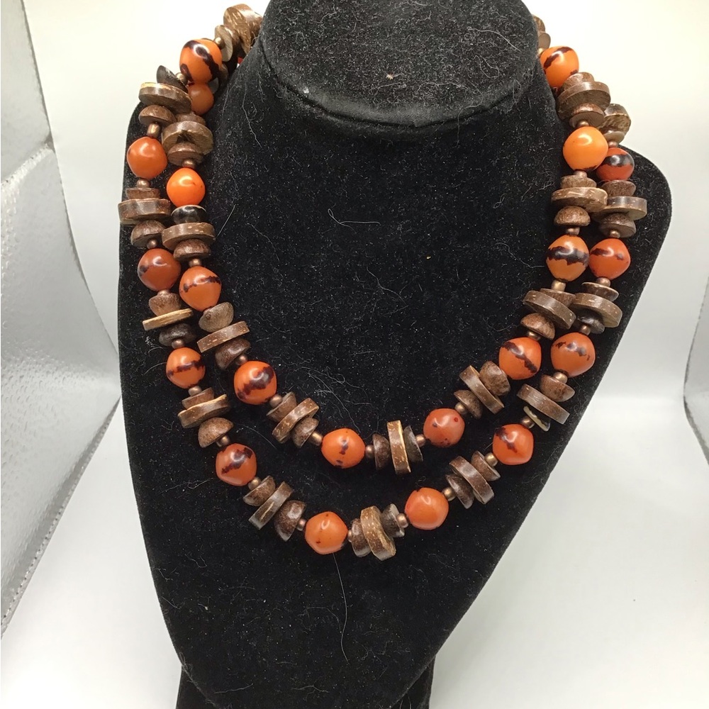 NWOT Beautiful wood and faux Orange pearl Necklace